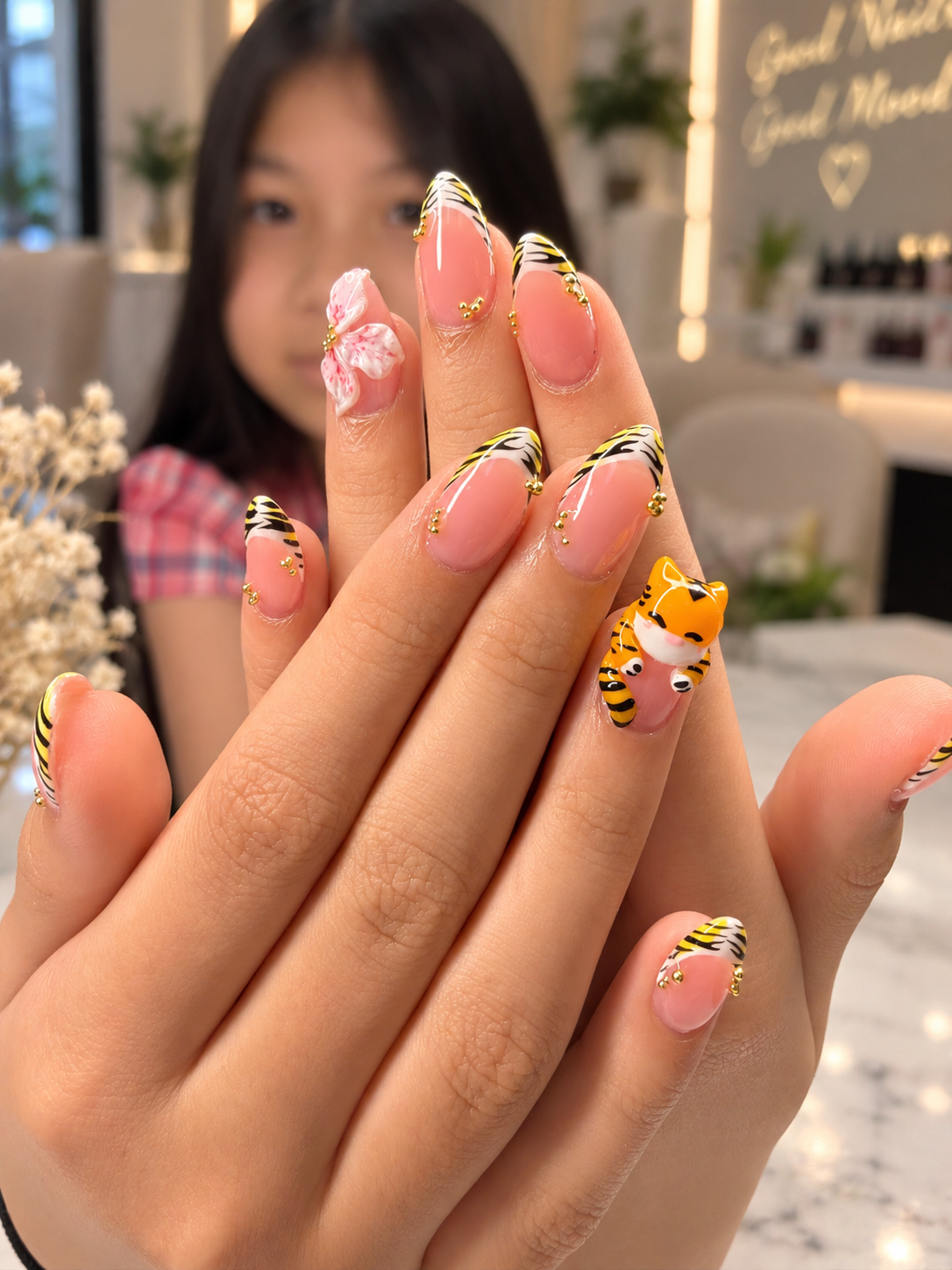 Playful tiger character custom hand-painted nail art